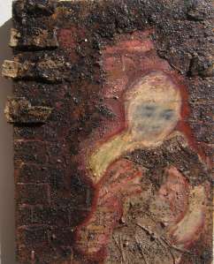 mother holding child out to the world